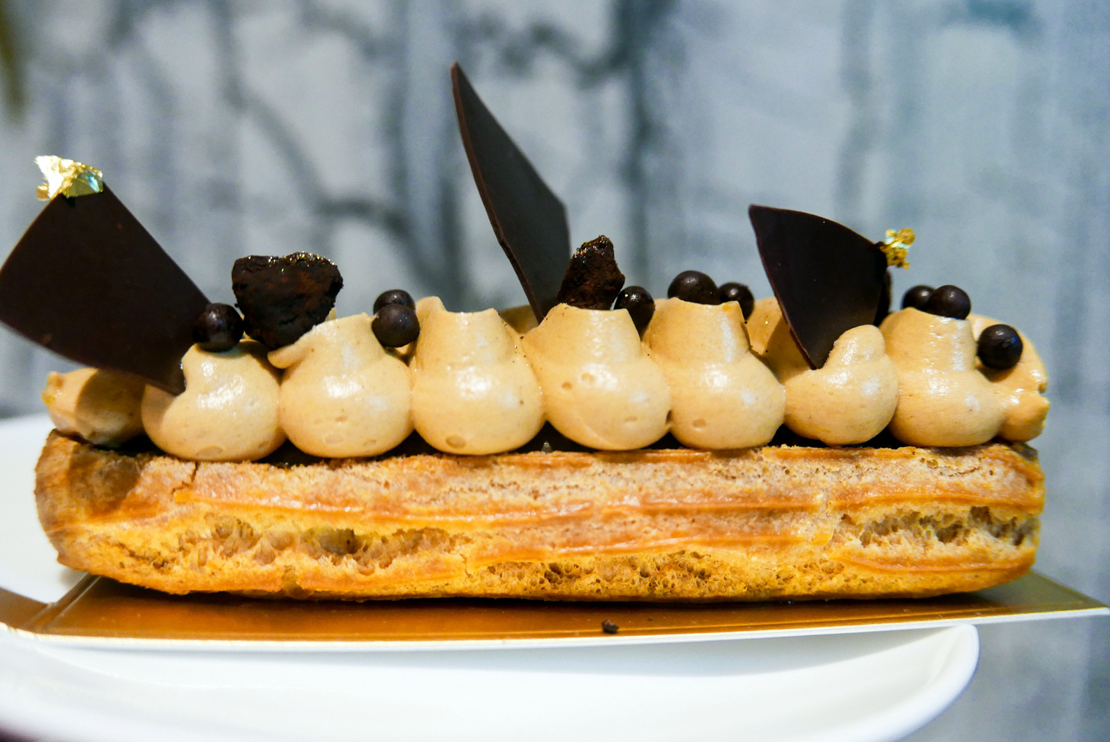 5. Xiao by Crustz - Goma Goma eclair, sesame ganache and hazelnut mousseline